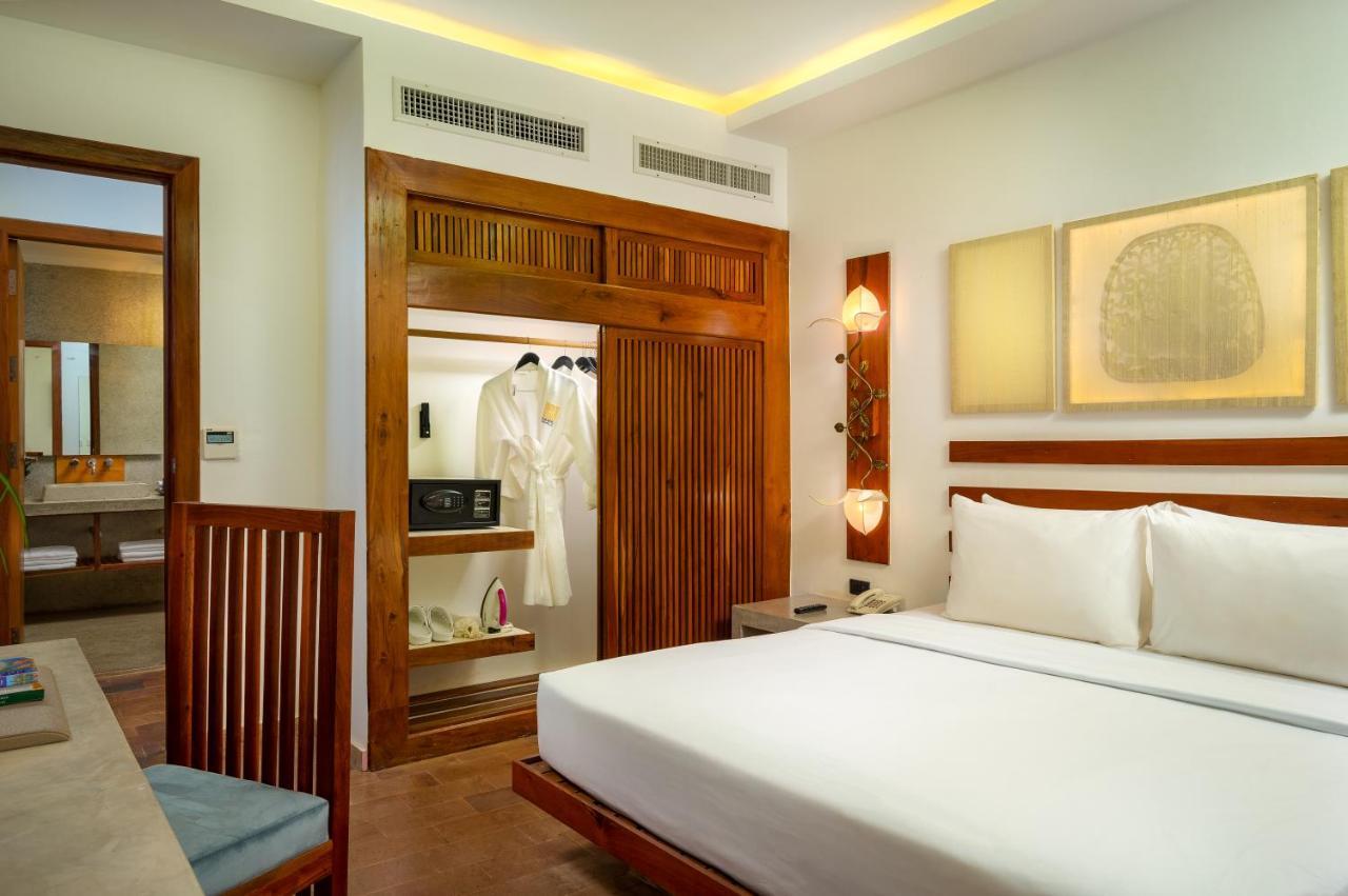 The Thirdfold Residence Сием Реап Стая снимка A bedroom at the Taj Bengal
